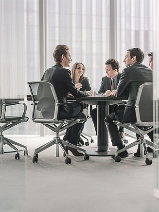 Four board members are looking out of the window