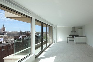 Foto van een leefruimte in een appartement in Amadeus in Den Haag.