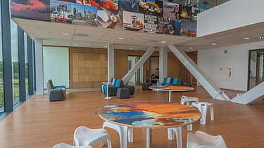 Photo of the interior of a new school building at Waalhaven in Rotterdam.